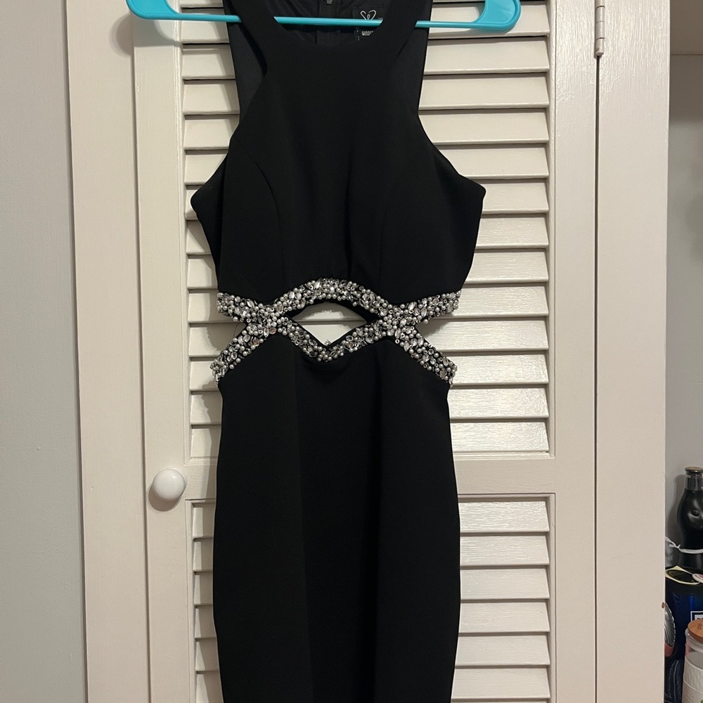 Elegant Black Dress with Embellished Waist